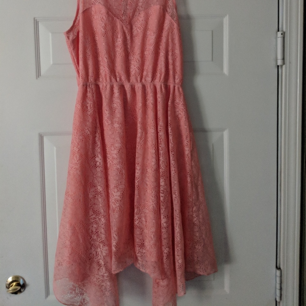 Peach colored asymmetrical dress